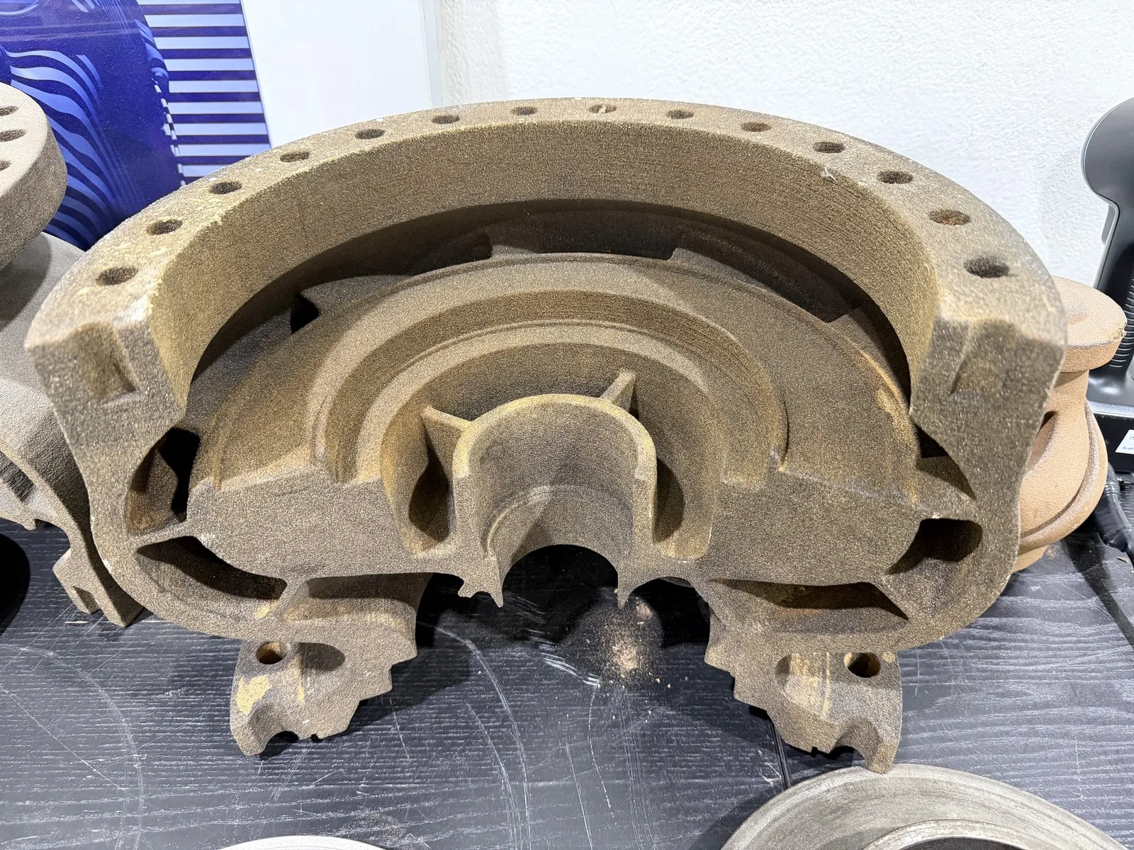 Sectioned 3D-printed sand core assembly for a pump casting