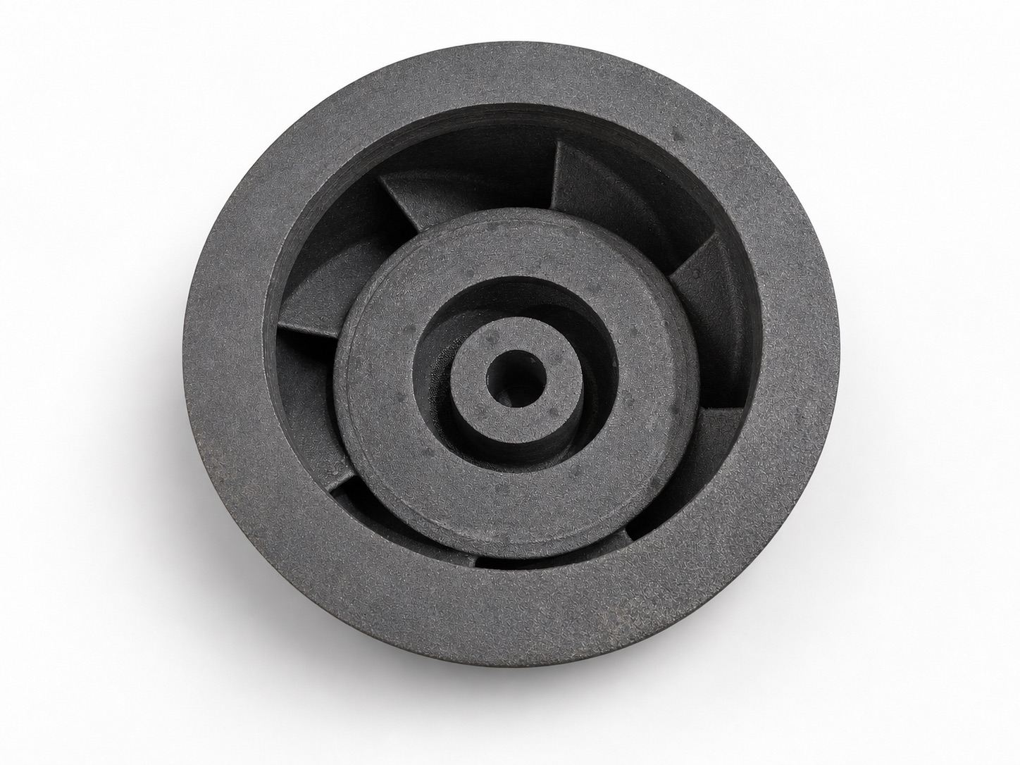 Top-down view of the as-cast steel pump bowl showing internal vane structure and central hub