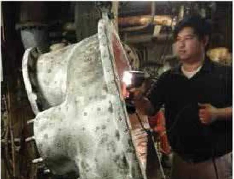 On-site three-dimensional scanning of a cooler shell, as published in the 2014 article.