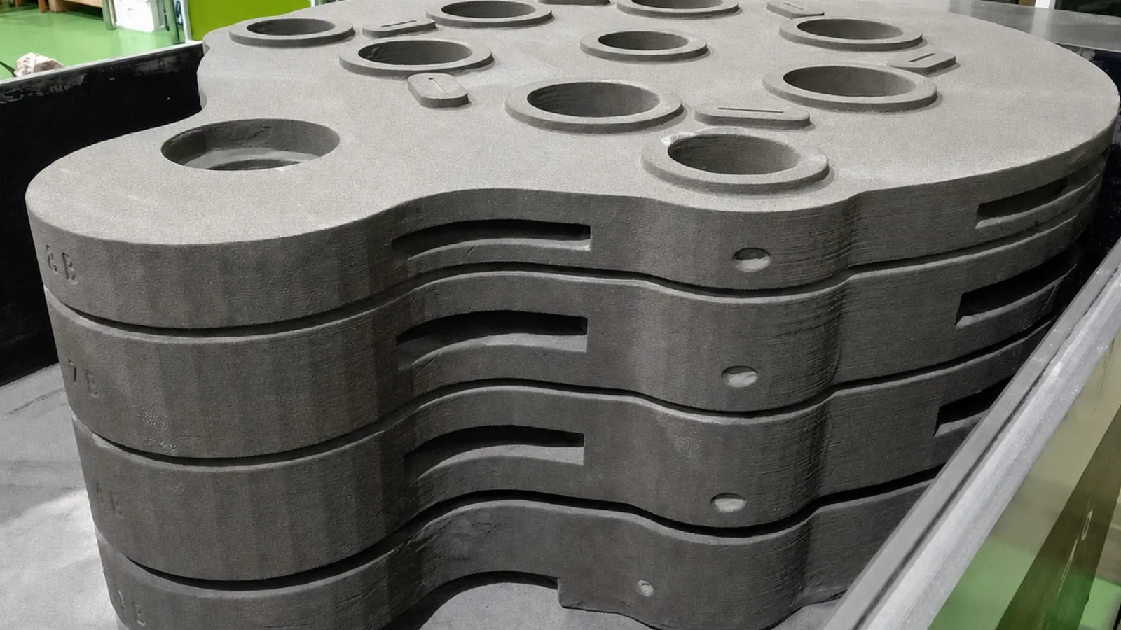 Stacked sand mold sections prepared for casting production