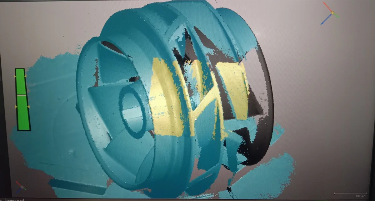 Digital geometry data of a complex impeller shown on screen during reconstruction assessment