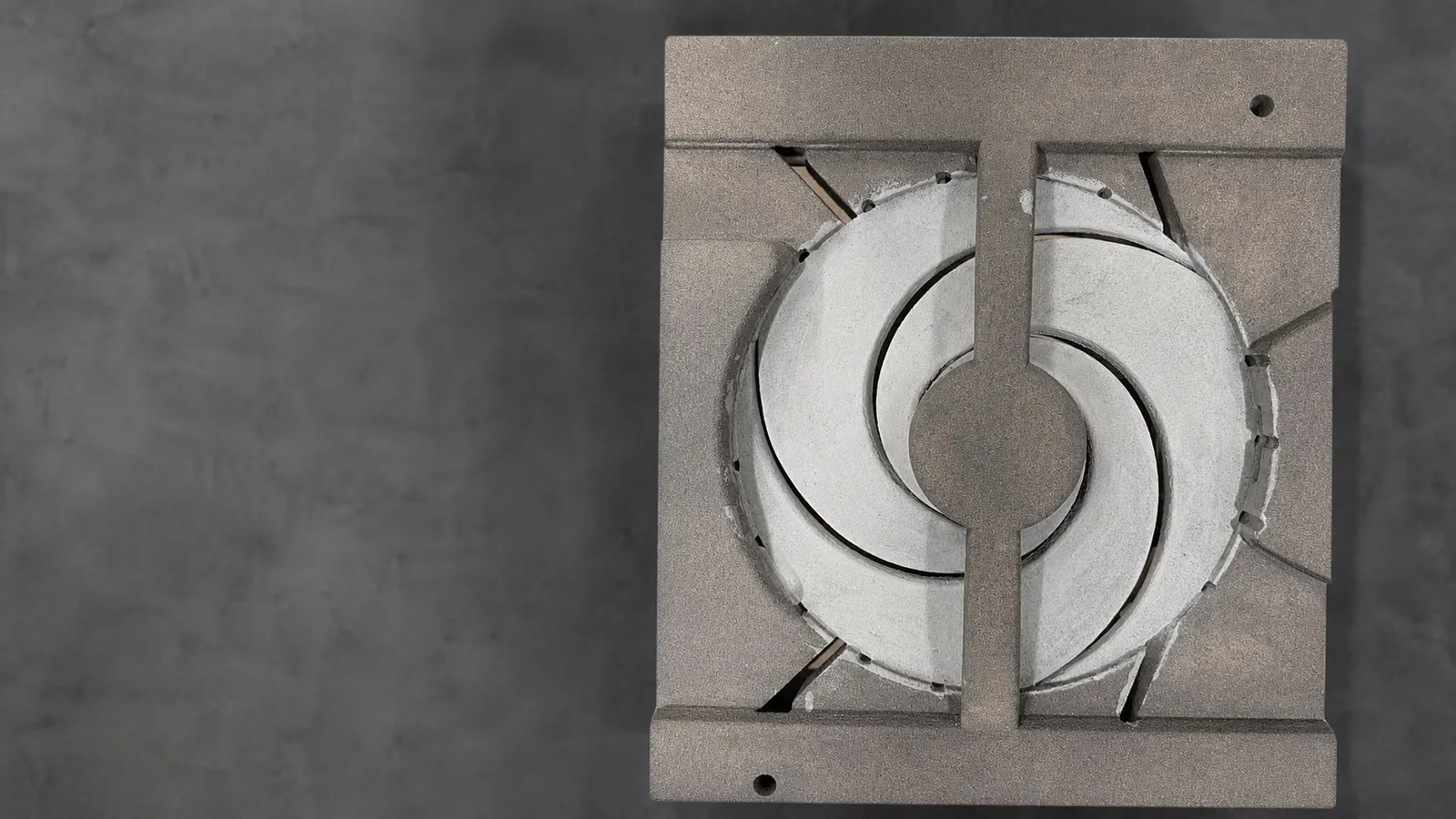3D-printed sand mold section showing an impeller cavity and internal passage detail